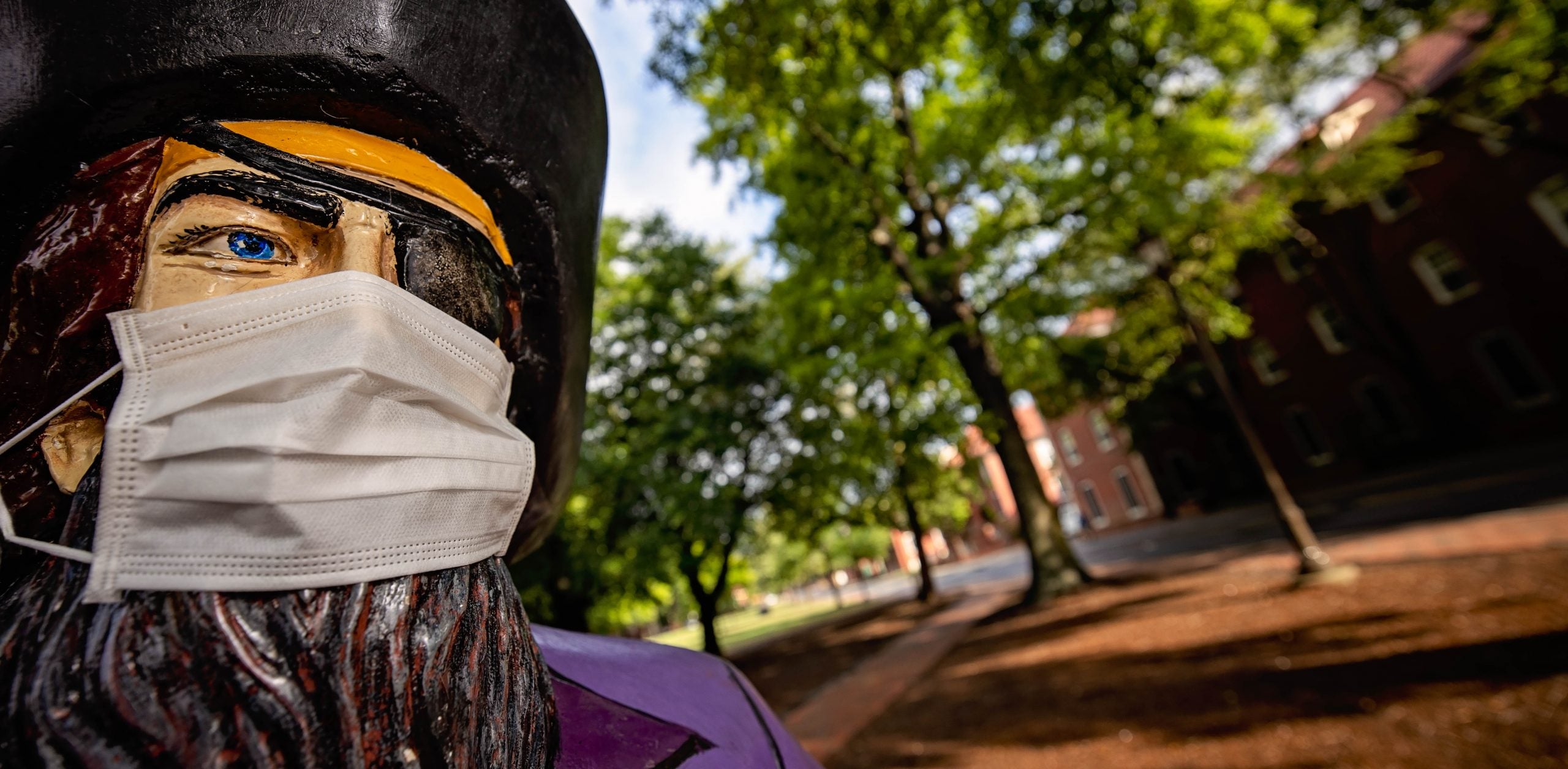 The Pirate on campus with a mask. (ECU Photo by Cliff Hollis)